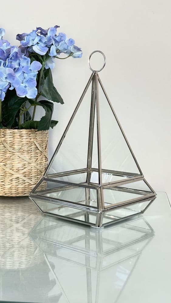 Glass pyramid candle holder