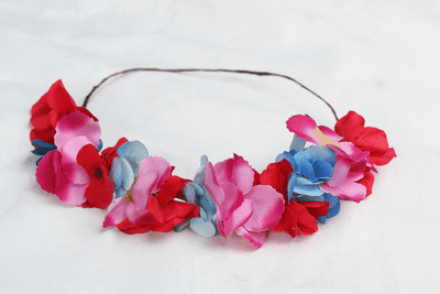 Artificial pink, blue festival flower crown