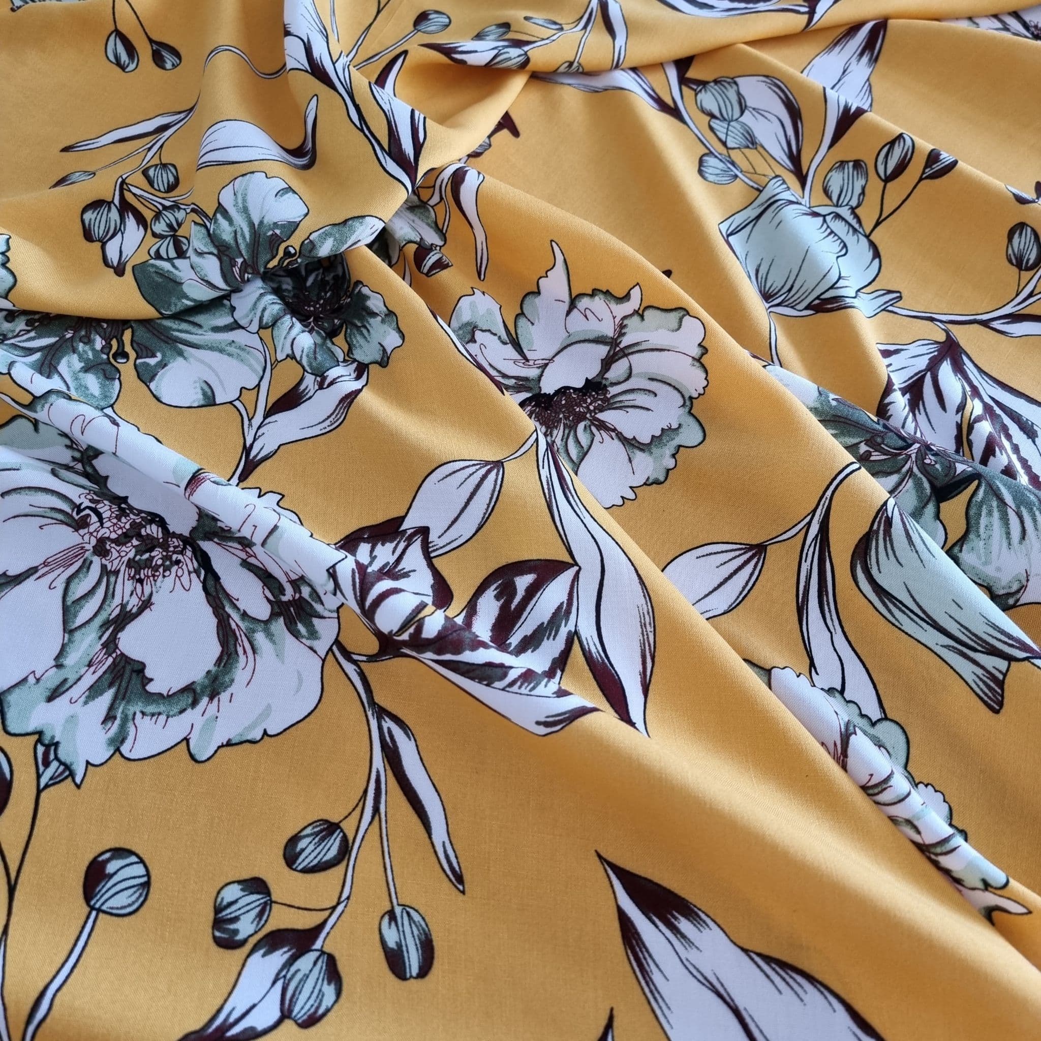 Yellow floral viscose challis fabric