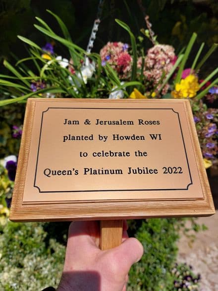 Engraved gold laminate memorial plaque with wood stake