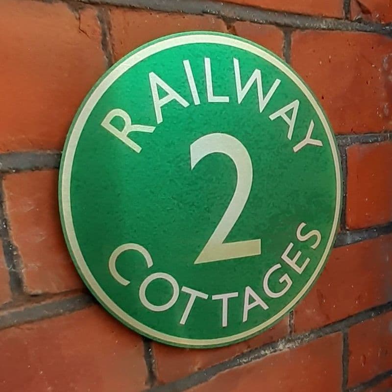 Green & brass vintage house sign