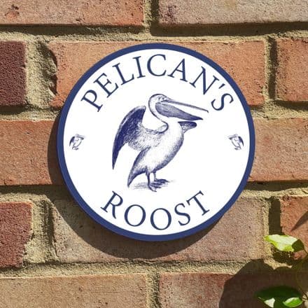 Pelican round house or beach hut sign