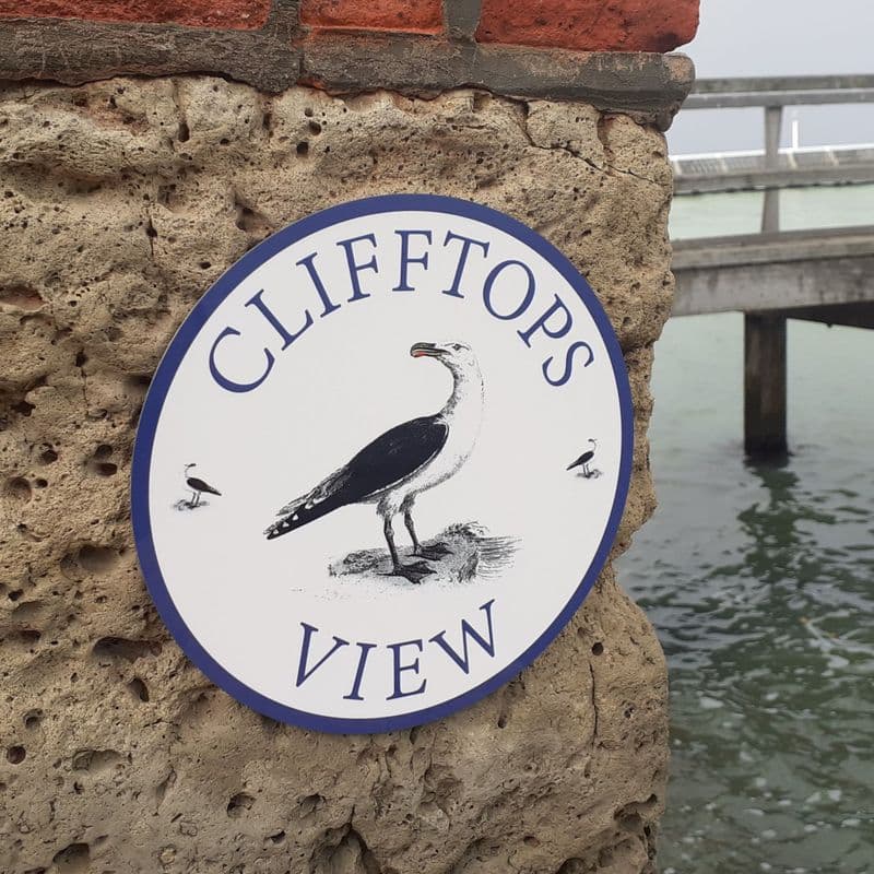 Seagull round house or beach hut sign