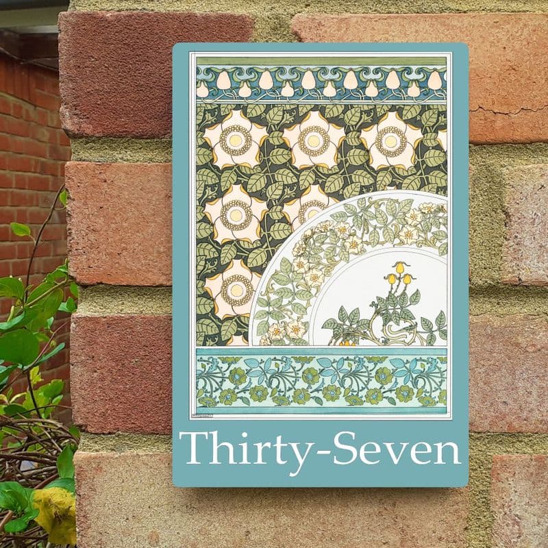 Wild rose house sign in Arts & Crafts style