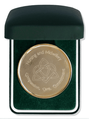 Gold Coin in a Green Leatherette Box