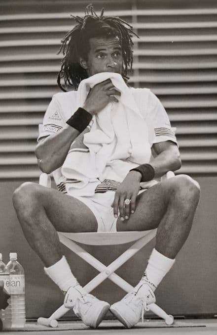 Yannick Noah Press Photo (Melbourne, 1990) "Change of Ends"