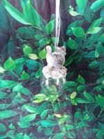 Cute Resin Birds in Hats sitting on a Iridescent Christmas Bauble Tree Decoration