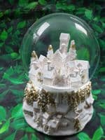 Pink and Gold Snowy Townscape Musical Chirstmas Globe