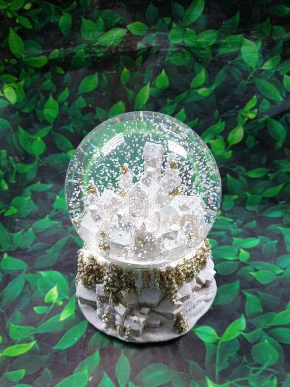 Pink and Gold Snowy Townscape Musical Chirstmas Globe