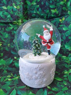Skating Santa Musical Christmas Snow Globe
