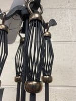 Cage handled black and antique companion set