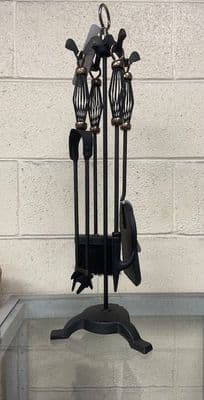 Cage handled black and antique companion set