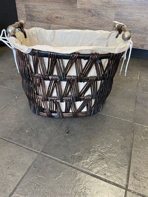 Medium oval dark brown finish basket with removeable liner