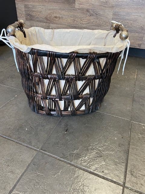Medium oval dark brown finish basket with removeable liner