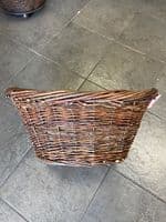 Small oval brown basket with liner