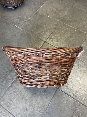 Small oval brown basket with liner