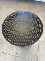 Small round fire pit with grill