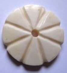 Handcarved white flower button