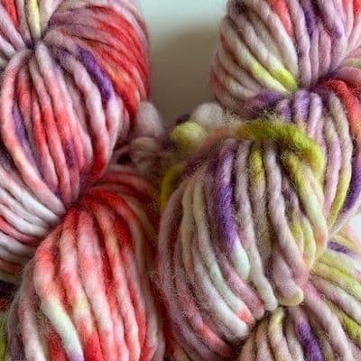 Pure merino chunky in muted red, blue and purple