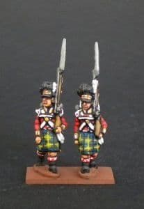 NB21- Highlanders flank company marching With Kilt