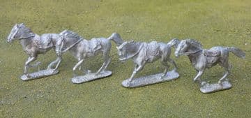 THEM23 Set of 4 Irregular Horses, sheepskin saddles