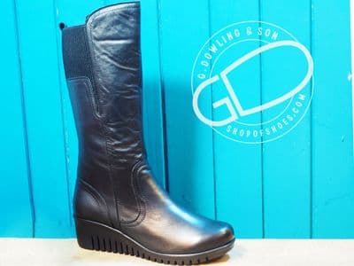 Black soft leather boot with wedge.