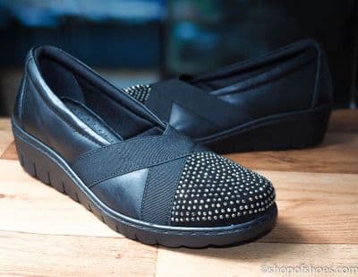Black soft leather high elastic fronted attractively  studded shoe.