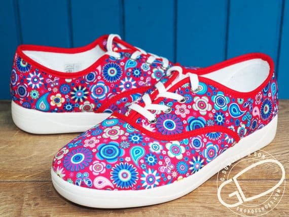 versatile 2E-4E 2V variable fit navy canvas summer shoe with pretty raised stitching and petal motif punching detail from an Db Easy b wide fit specialist near Basingstoke Hampshire.