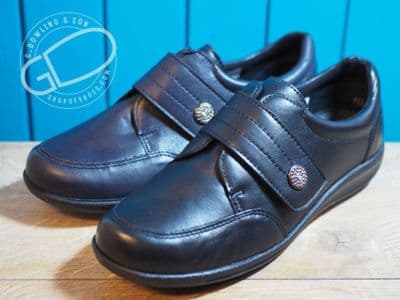 Ladies soft leather touch fastening wide 2v shoe. In navy or black