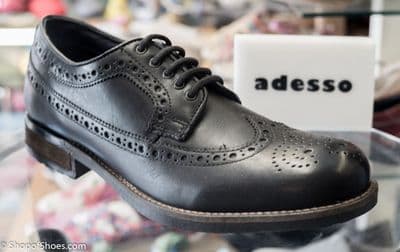 Leather Brogue in black with comfort footbed and flexible deep tread rubber sole.