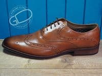 Leather Brogue in tan with flexible leather look sole.