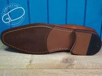 Leather Brogue in tan with flexible leather look sole.