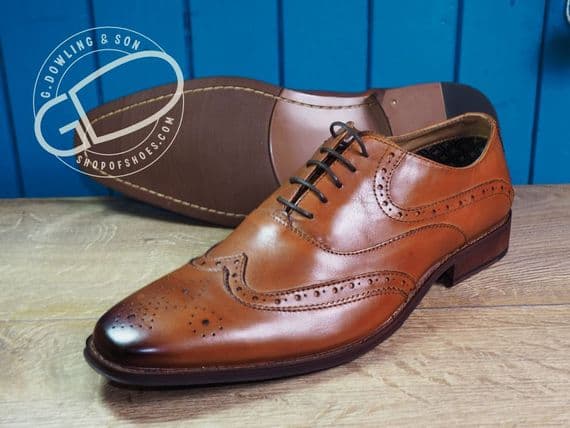 Leather Brogue in tan with flexible leather look sole.