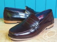 Modern high shine real leather loafer with  hard wearing leather look sole.