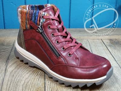 Warm fleece lined side zipped laced soft non leather red boot.
