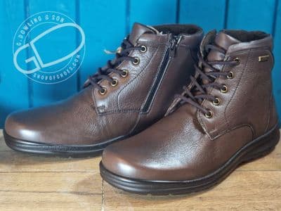 Waterproof everyday laced leather boot with easy on side zip.