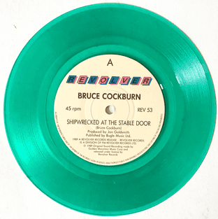 Bruce Cockburn - Shipwrecked At The Stable Door (7") (Green Vinyl) (EX/G-VG)
