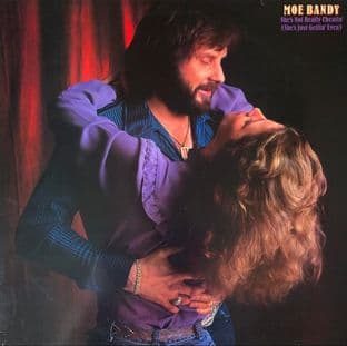 Moe Bandy - She's Not Really Cheatin' (She's Just Gettin' Even) (LP) (EX-/VG-)