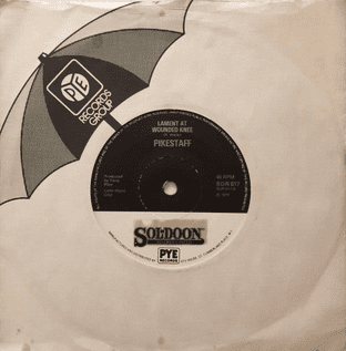 Pikestaff - Lament At Wounded Knee (7") (G+/G)