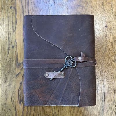 20cm soft leather foldover notebook with key fastening