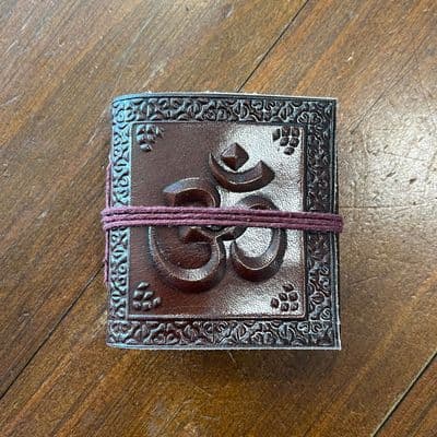 7cm notebook with Om design