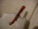 Concorde hair clip shades of red stone.s