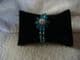 Fashion beaded bracelet blue and silver with blue flower .