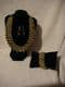 fashion Coller Necklace, Bracelet & Earring set in multi coloured and gold metal.