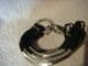 fashion multi standed  bracelet  in black and silver.