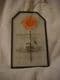 Glass Garden Plaque orange flower (Gardeners Know All The Dirt).