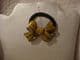 Hair band ponytail holder bow in yellow and peach.