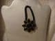 Hair band ponytail holder flower black set in antique brass.