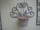 Aged metal wall mounted single flower pot holder