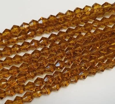 Faceted Glass Bicone - 6mm - 26 beads - Amber